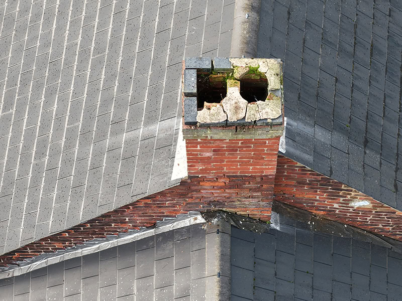 Drone-inspection-revealing-chimney-crown-and-flaunching-defects-bramble-and-wagg